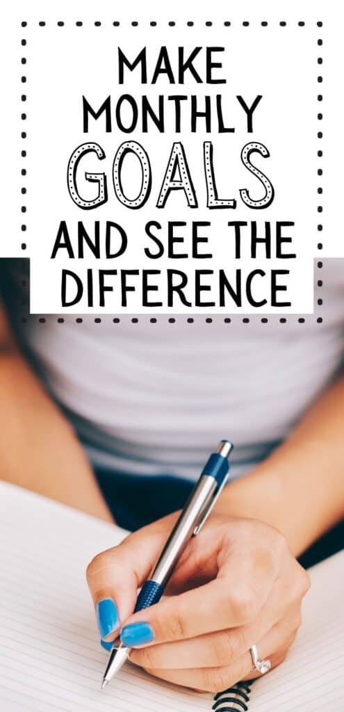 woman writing down monthly goals. Text overlay make monthly goals and see the difference 