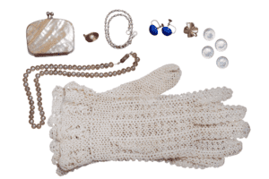 Feminine Energy with these accessories. White gloves, pearl necklace, little earrings and a change purse. 