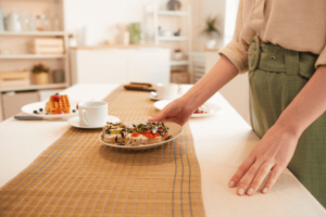 classy woman sets the table
