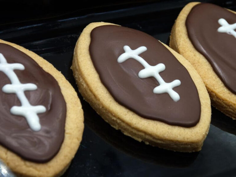 Football cookies with chocolate icing