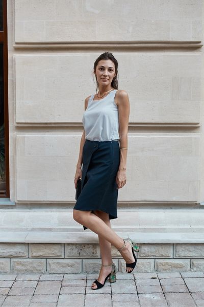 Old Money Summer Outfit: A woman wearing a grey Pencil skirt