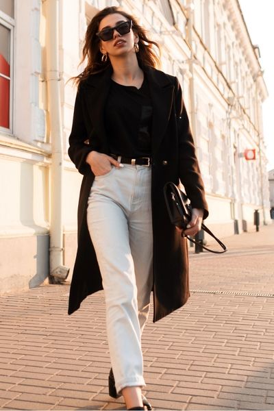 Old Money Summer Style: Woman with off-white or beige pants